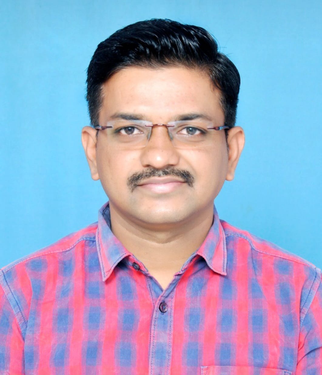 DR. ISHWAR D. MHASLEKAR